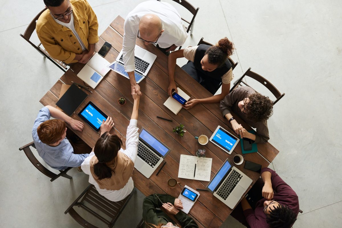 TrackElf team collaborating around a table
