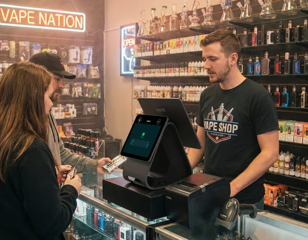 Vape shop counter serving a customer
